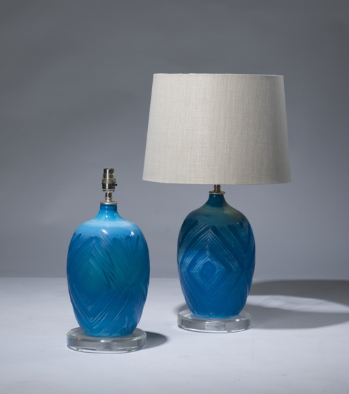 Pair Of Small Blue Cut Glass Lamps On Perspex Bases
