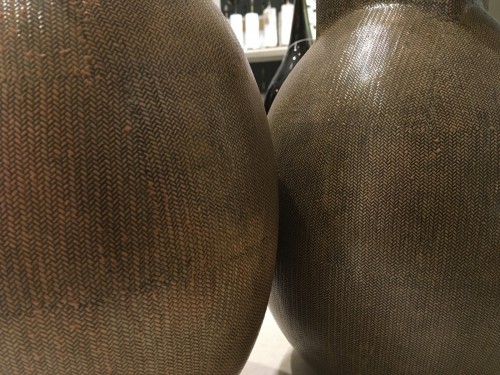 Pair Of Medium Brown Oval Rattan Lamps On Distressed Brass Bases