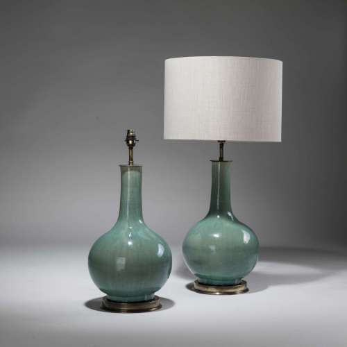 Pair Of Medium Green Glazed Ceramic Teardrop Lamps On Distressed Brass Bases