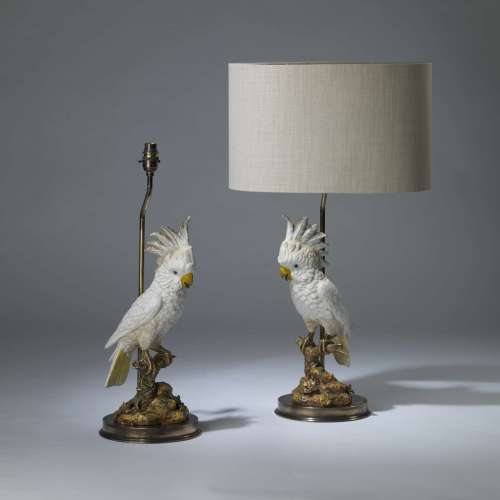 Pair Of Medium White Ceramic Parrot Lamps On Round Brass Bases
