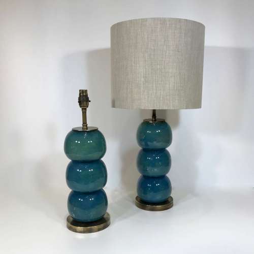 Pair Of Small Teal Glass Ball Lamps On Round Antique Brass Bases