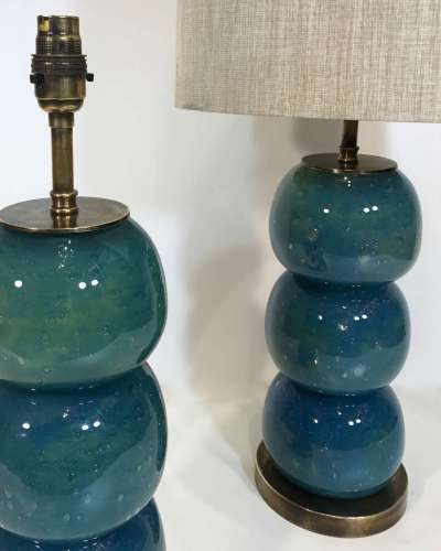 Pair Of Small Teal Glass Ball Lamps On Round Antique Brass Bases
