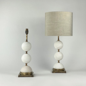 Pair Of Medium Cream Alabaster Ball Lamps On Antique Brass Bases (T7505)