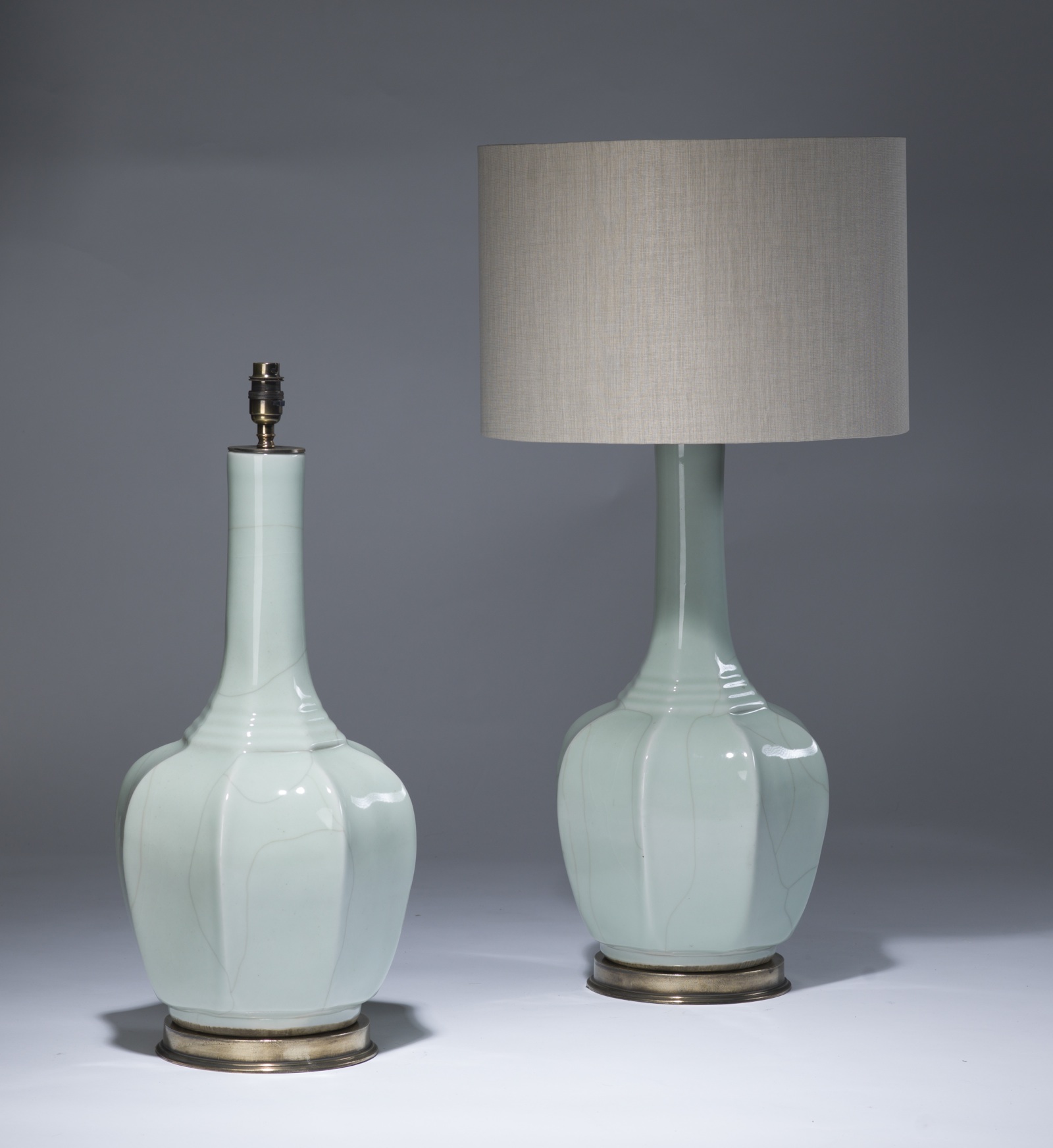 Pair Of Large Pale Blue Celadon Lamps On Distressed Br Pair Of Large Pale Blue Celadon Lamps On Distressed Br