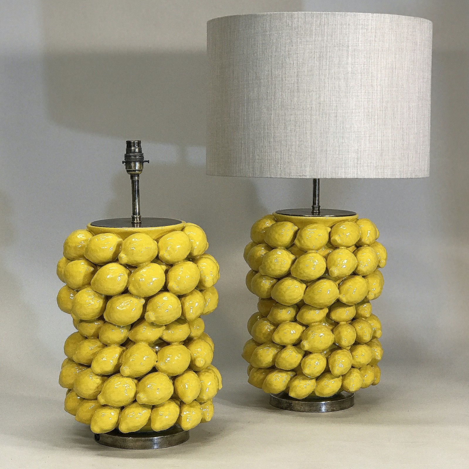 Pair Of Large Yellow Ceramic Lemon Lamps With Antique Brass Bases