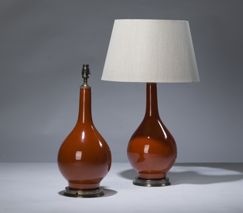 Pair Of Medium Burnt Orange Ceramic Lamps On Distressed Brass Bases