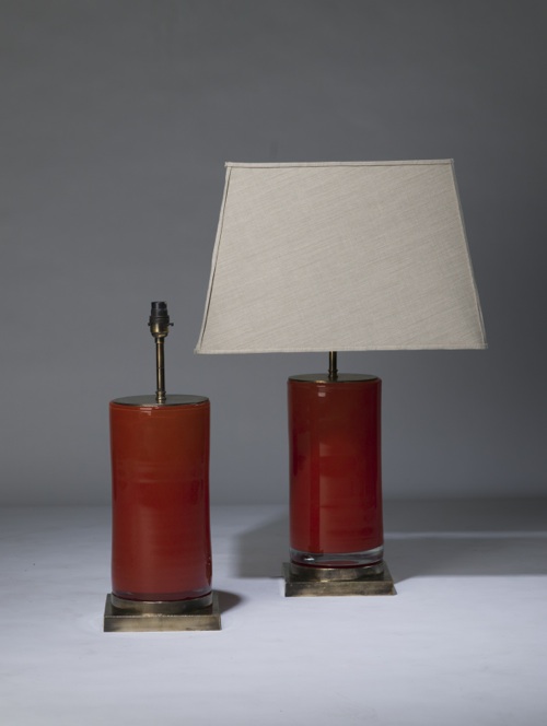 Pair Of Medium Dark Orange 'glass Column' Lamps On Distressed Brass Bases