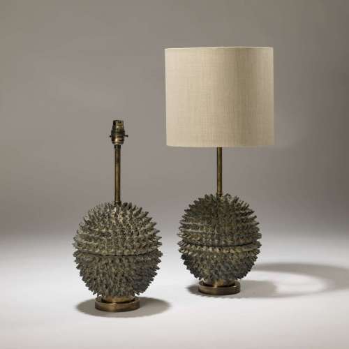 Pair Of Small Grey Wooden Spike Balls On Distressed Brass Bases