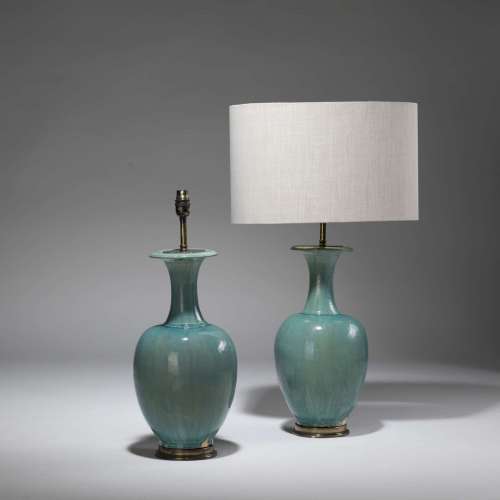 Pair Of Medium Green Glazed Ceramic Lamps On Distressed Brass Bases