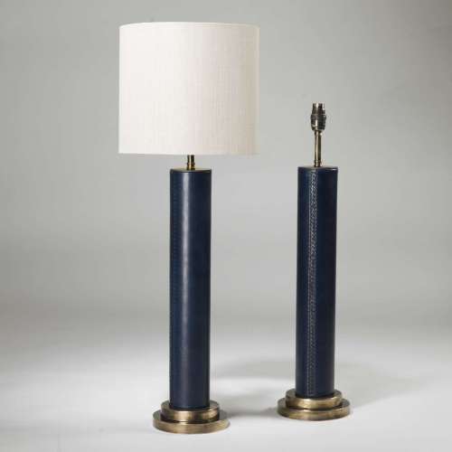 Pair Of Tall Navy Blue Hand Stitched Leather Lamps On Brass Bases