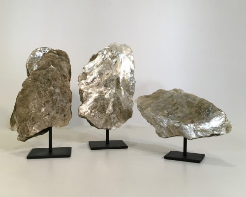 Pieces Of Layered Shimmery Mica On Metal Stands