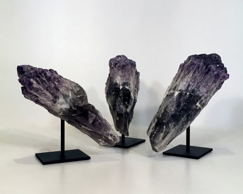 Pieces Of Textured Violet Quartz On Metal Stands
