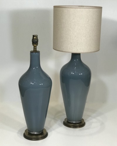Pair Of Dark Grey 'standard' Glass Lamps On Round Distressed Brass Bases