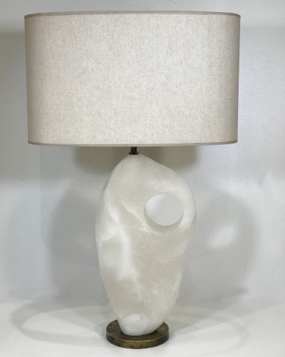A Single Large Alabaster Lamp On Distressed Brass Base