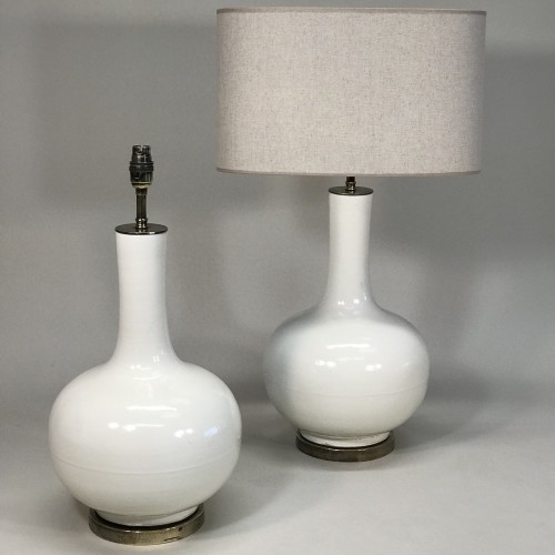 Pair Of Medium Cream Ceramic Teardrop Lamps On Antique Brass Bases