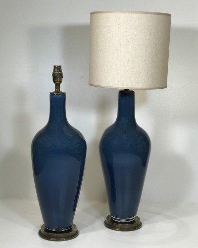 Pair Of Medium Glass 'standard' Lamps In Denim Blue On Distressed Brass Bases