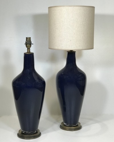 Pair Of Medium Glass 'standard' Lamps In Navy Blue On Distressed Brass Bases