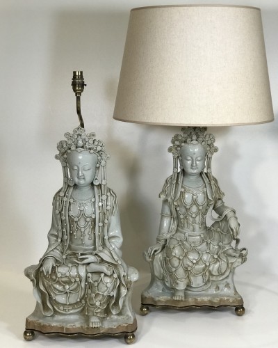 Pair Of Large Hint Of Blue Ceramic Buddhas On Shaped Distressed Brass Bases