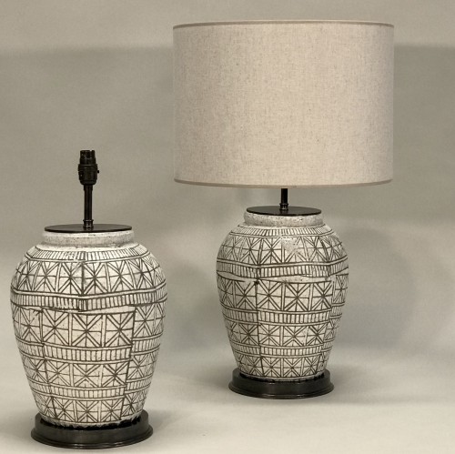 Pair Of Large Cream And White Geometric Patterned Ceramic Lamps On Bronze Brass Bases