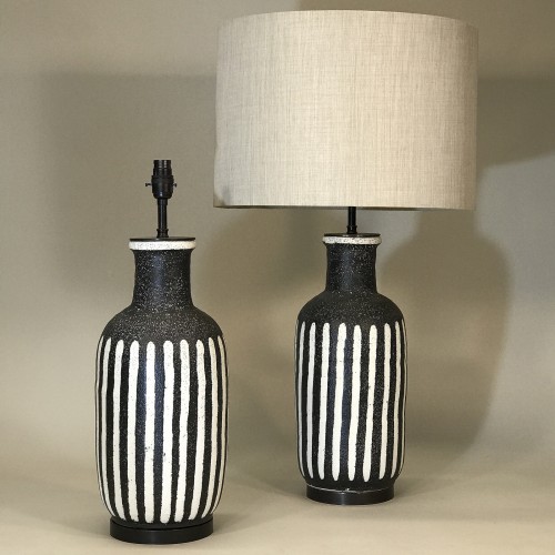 Pair Of Medium Black And White Ceramic Lamps On Brown Bronze Bases