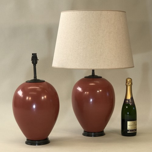 Pair Of Medium Coral Pink Ceramic 'balloon' Lamps On Brown Bronze Bases