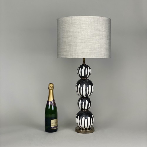 Pair Of Black And White 'drip' Stacked Ceramic Ball Lamps With Antique Brass Bases