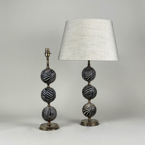 Pair Of Black 'zebra' Majapahit Glass Bead Lamps With Antique Brass Bases