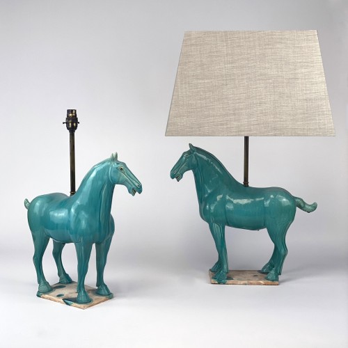 Pair of medium ceramic blue horses on ceramic bases