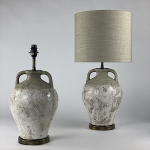 White Aged Urn Lamps On Antique brass bases (T6845)